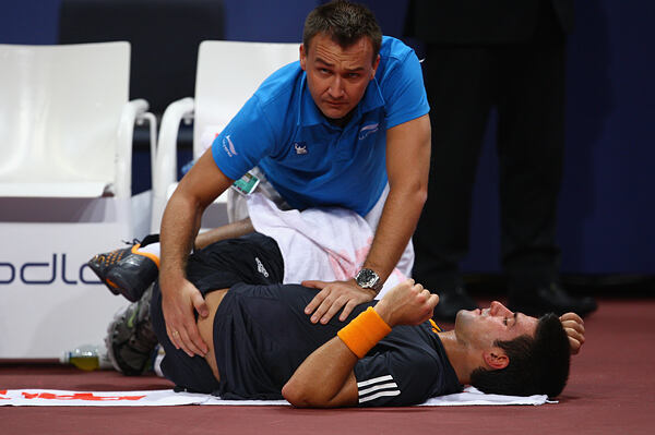 Michal Novotný a světová tenisová jednička Novak Djoković